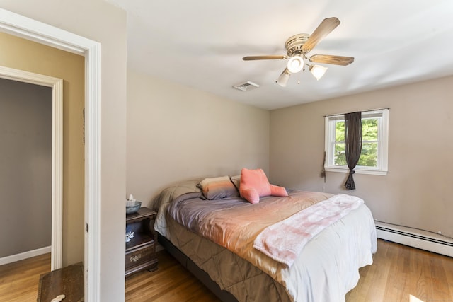 17 Stony Brook Rd, Brookfield, CT 06804 - bedroom with a baseboard radiator, wood finished floors, and ceiling fan