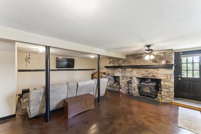 17 Stony Brook Rd, Brookfield, CT 06804 - unfurnished living room with a wood stove, a ceiling fan, and finished concrete floors