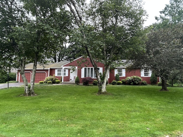 16 Round Hill Cir, Naugatuck, CT 06770 - ranch-style home with a garage, a front lawn, and driveway