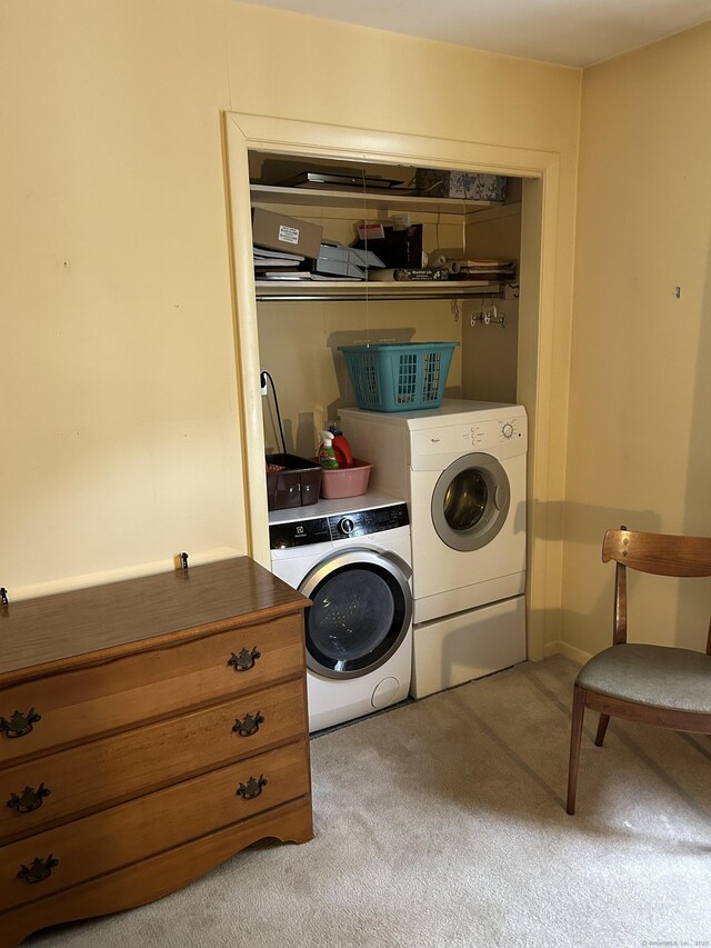 16 Round Hill Cir, Naugatuck, CT 06770 - washroom with washer and clothes dryer and light carpet