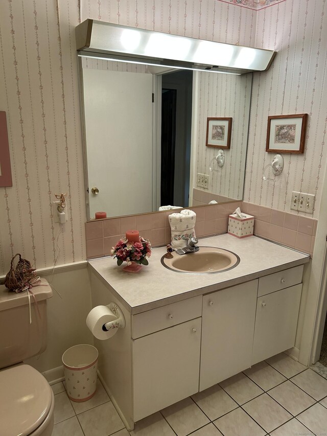 16 Round Hill Cir, Naugatuck, CT 06770 - bathroom with tile patterned floors, vanity, and wallpapered walls