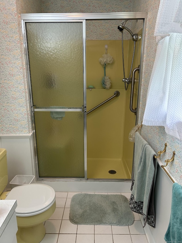 16 Round Hill Cir, Naugatuck, CT 06770 - bathroom with tile patterned floors, a stall shower, and vanity