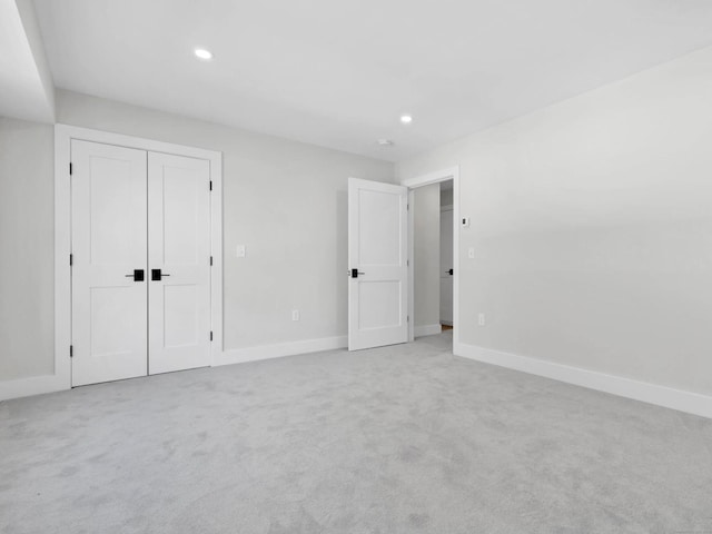 138 Boston Post Rd Unit 15, East Lyme, CT 06333 - unfurnished bedroom with recessed lighting, light colored carpet, and a closet