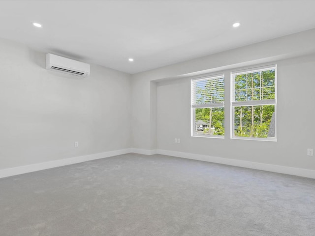138 Boston Post Rd Unit 15, East Lyme, CT 06333 - carpeted spare room with a wall mounted air conditioner and recessed lighting