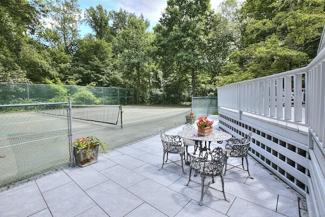 174 Cross Hwy, Westport, CT 06880 - view of patio / terrace featuring a tennis court and view of scattered trees