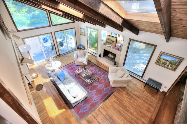 174 Cross Hwy, Westport, CT 06880 - living area featuring wood finished floors and a fireplace with raised hearth