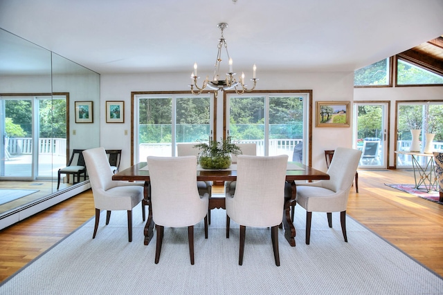 174 Cross Hwy, Westport, CT 06880 - dining space featuring a chandelier and light wood-style flooring