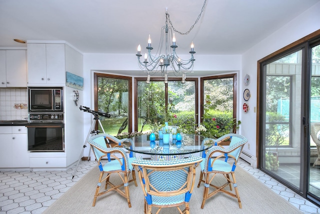 174 Cross Hwy, Westport, CT 06880 - dining area featuring a chandelier, healthy amount of natural light, and baseboard heating