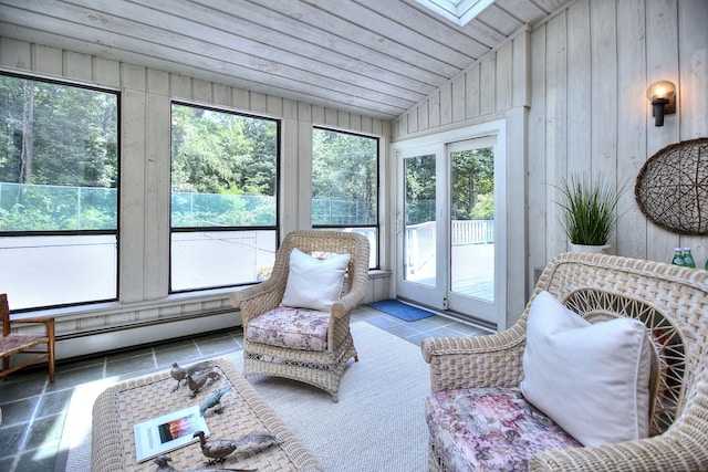 174 Cross Hwy, Westport, CT 06880 - sunroom / solarium featuring lofted ceiling, a skylight, french doors, and a baseboard radiator