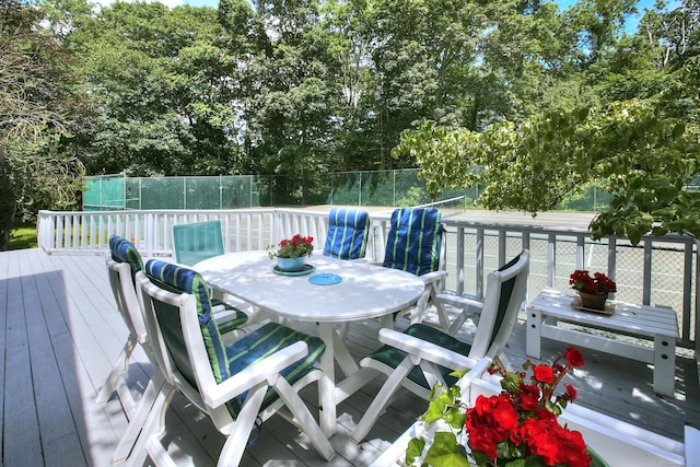 174 Cross Hwy, Westport, CT 06880 - deck featuring outdoor dining space and view of scattered trees