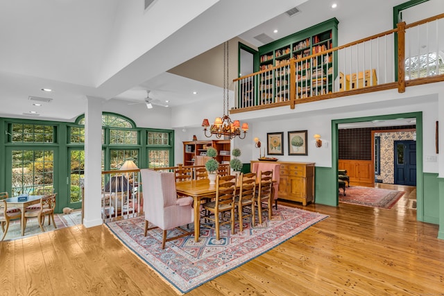 604 W Lake Ave, Guilford, CT 06437 - dining area with a towering ceiling, hardwood / wood-style floors, a ceiling fan, recessed lighting, and ornate columns