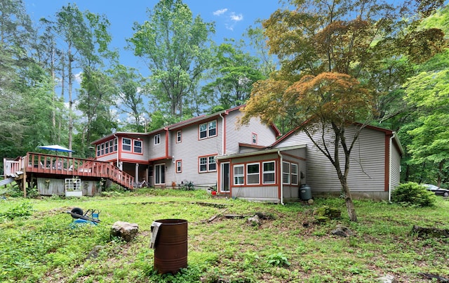 79 Ledgewood Dr, North Branford, CT 06471 - rear view of house featuring a wooden deck and stairway