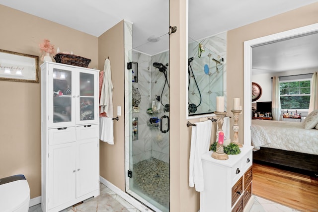 79 Ledgewood Dr, North Branford, CT 06471 - ensuite bathroom featuring a shower stall and baseboards