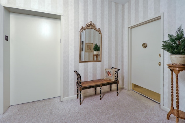 3200 Park Ave Unit 6A2, Bridgeport, CT 06604 - foyer with elevator, carpet floors, and wallpapered walls