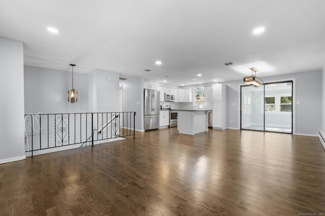 32 Cullen Ave, West Haven, CT 06516 - unfurnished living room with recessed lighting and dark wood finished floors
