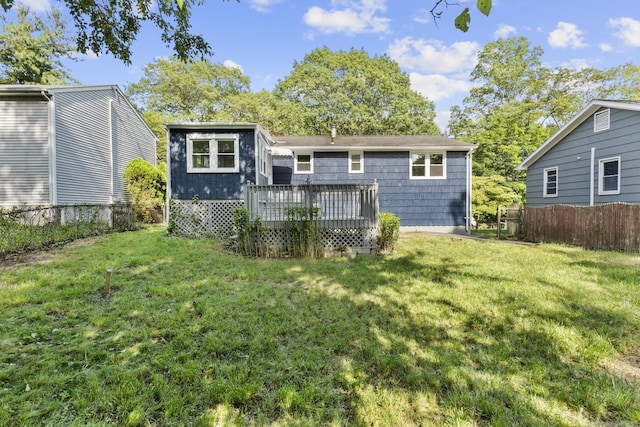 32 Cullen Ave, West Haven, CT 06516 - back of property featuring a wooden deck and a fenced backyard