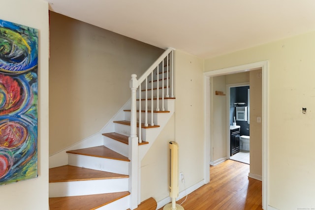 180 Lake Ave, Bristol, CT 06010 - stairway with wood finished floors and baseboards