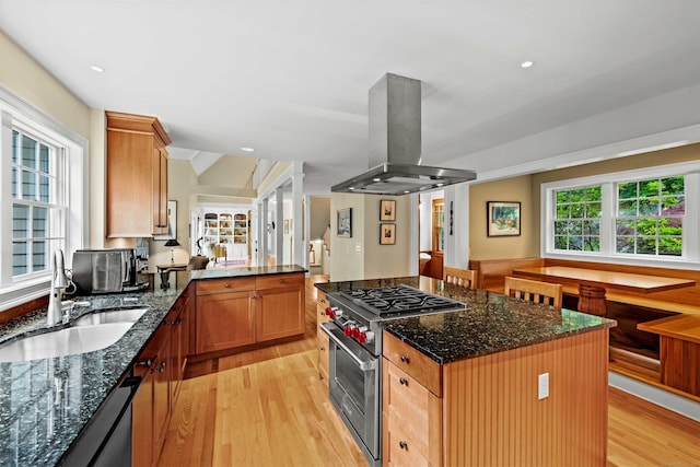 95 Shailer Pond Rd, Deep River, CT 06417 - kitchen with high end range, island range hood, light wood-style flooring, a peninsula, and dark stone counters