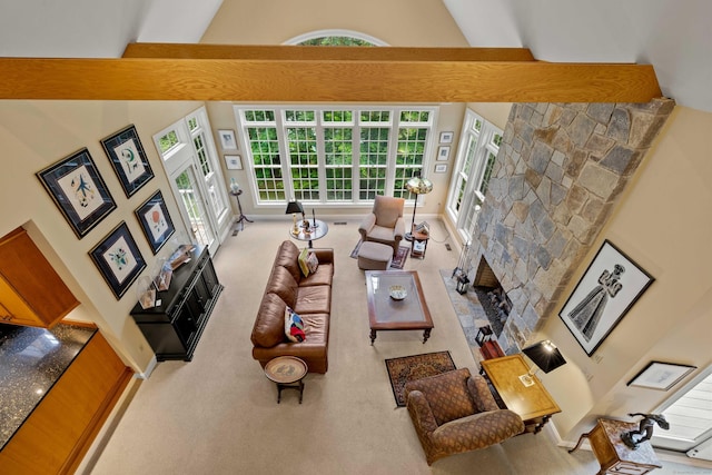 95 Shailer Pond Rd, Deep River, CT 06417 - carpeted living area with a fireplace and a high ceiling