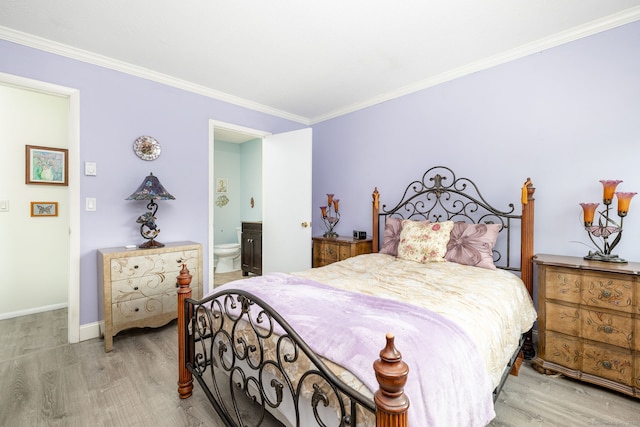 85 N Main St Unit 96, East Hampton, CT 06424 - bedroom with crown molding, wood finished floors, and connected bathroom
