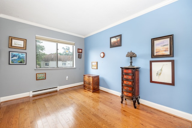 85 N Main St Unit 96, East Hampton, CT 06424 - empty room with baseboard heating, light wood finished floors, and ornamental molding
