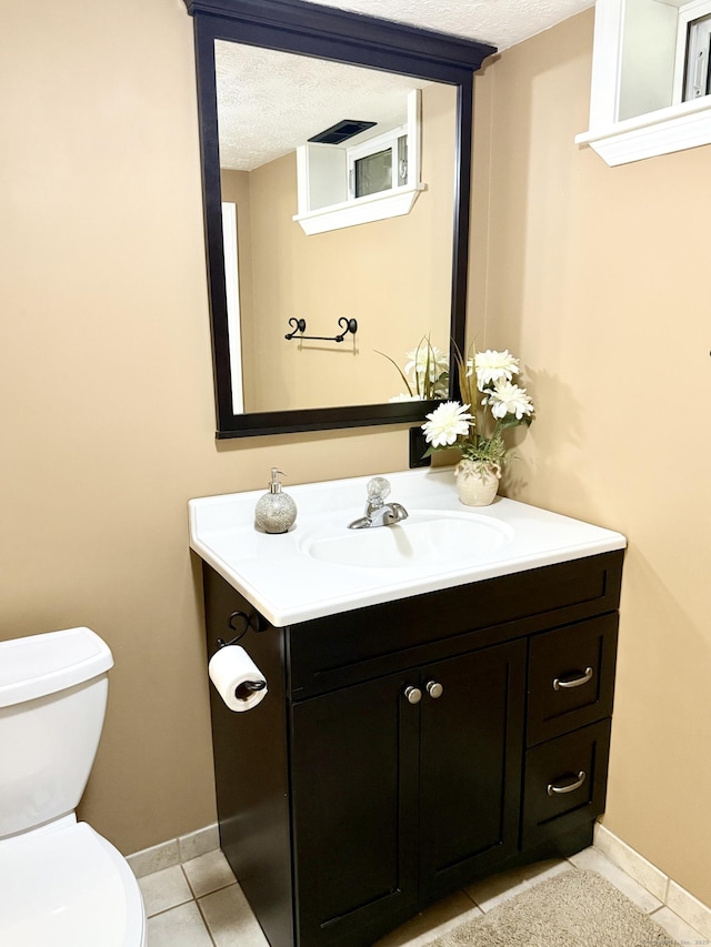 3951 S St, Coventry, CT 06238 - bathroom featuring a textured ceiling, vanity, and tile patterned floors