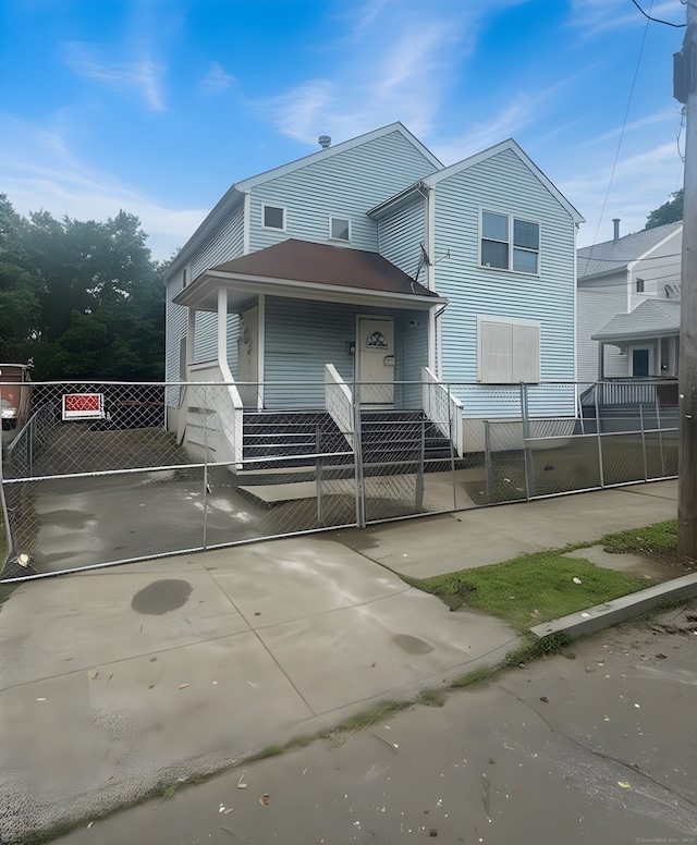 23 Dewitt St, New Haven, CT 06519 - view of front facade with a gate