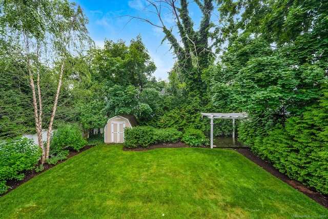 10 Sable St, Norwalk, CT 06854 - view of grassy yard featuring a storage unit