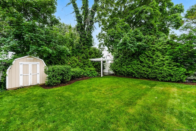 10 Sable St, Norwalk, CT 06854 - view of grassy yard featuring a shed