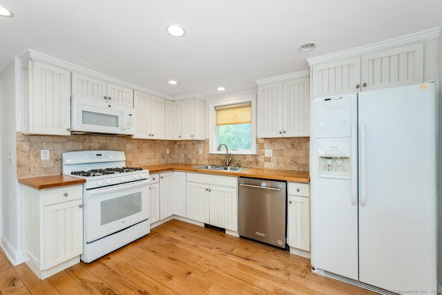 10 Sable St, Norwalk, CT 06854 - kitchen featuring white appliances, wooden counters, light wood-type flooring, backsplash, and recessed lighting
