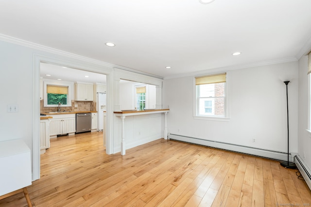10 Sable St, Norwalk, CT 06854 - unfurnished living room with a baseboard heating unit, crown molding, light wood-style flooring, and recessed lighting