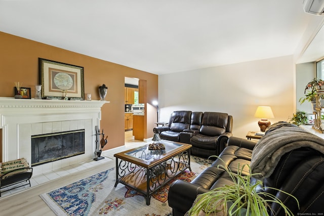 480 Wall St, Hebron, CT 06248 - living room featuring an AC wall unit, healthy amount of natural light, and a tile fireplace
