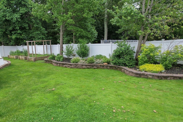 123 Sperry Ln, Meriden, CT 06451 - fenced backyard featuring a vegetable garden