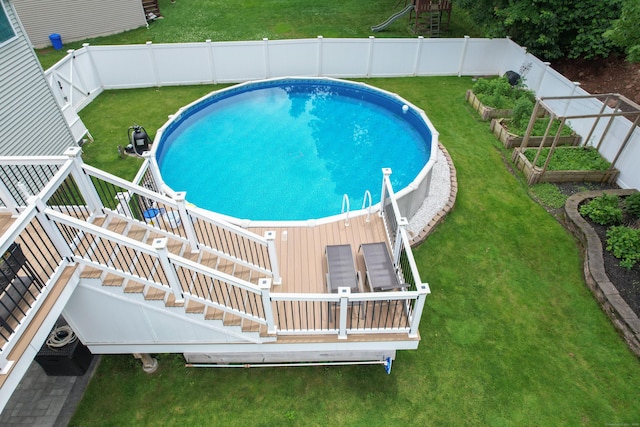 123 Sperry Ln, Meriden, CT 06451 - view of pool featuring a garden, a fenced backyard, stairway, and a wooden deck