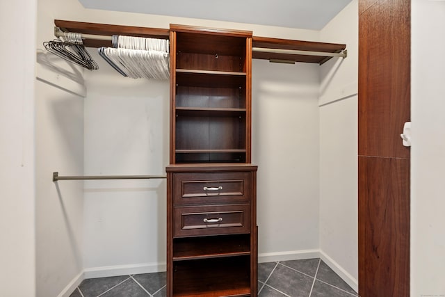 123 Sperry Ln, Meriden, CT 06451 - walk in closet featuring dark tile patterned flooring