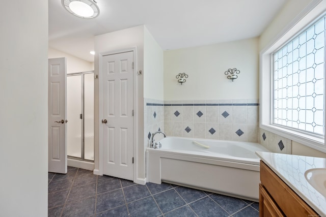 123 Sperry Ln, Meriden, CT 06451 - bathroom featuring tile patterned floors, a garden tub, a shower stall, and vanity