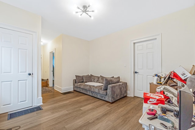 190 Whitney Ave, Bridgeport, CT 06606 - living area with light wood-style floors and baseboards