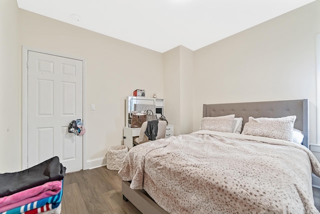 190 Whitney Ave, Bridgeport, CT 06606 - bedroom with dark wood finished floors and baseboards