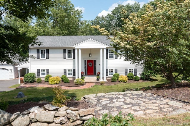 10 Laurel Grove Dr, Haddam, CT 06441 - raised ranch featuring a front lawn and an outdoor structure
