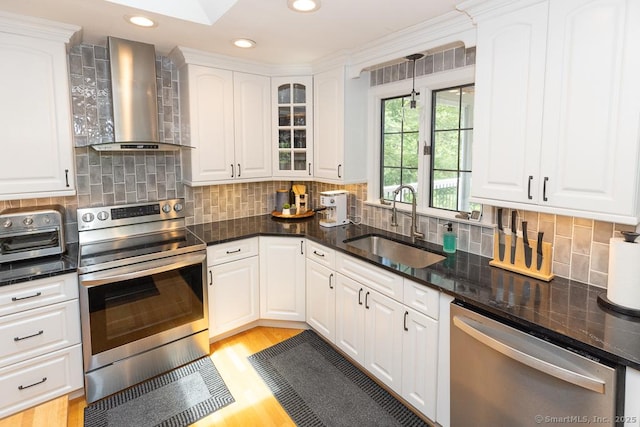 10 Laurel Grove Dr, Haddam, CT 06441 - kitchen featuring stainless steel appliances, wall chimney exhaust hood, white cabinets, glass insert cabinets, and recessed lighting