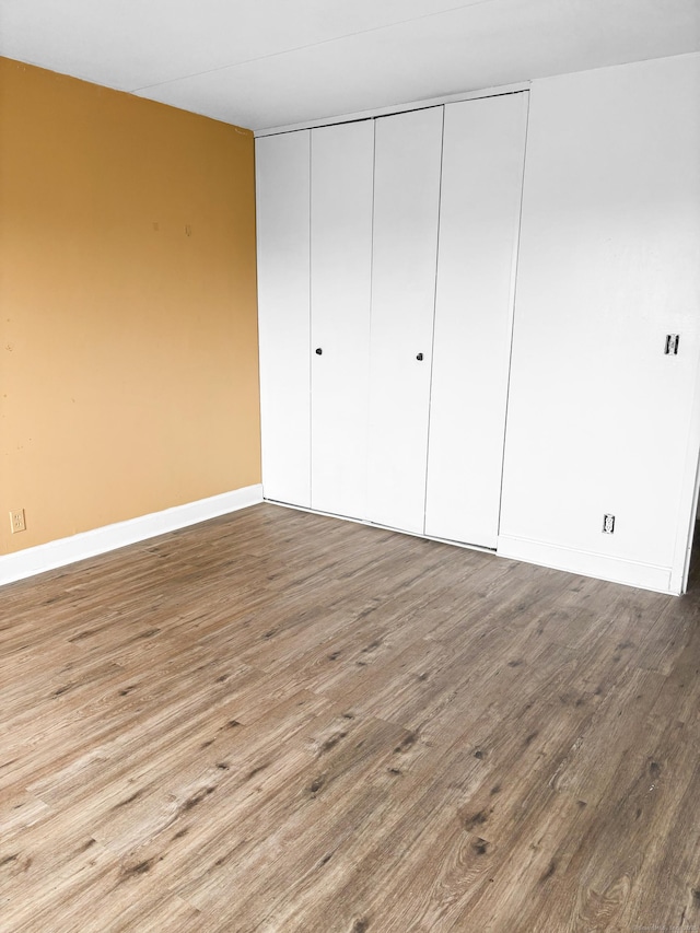 120 Huntington Tpke Unit 606, Bridgeport, CT 06610 - unfurnished bedroom with a closet and wood finished floors