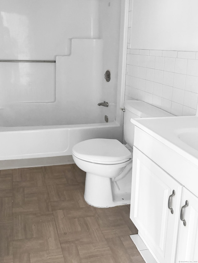 120 Huntington Tpke Unit 606, Bridgeport, CT 06610 - bathroom featuring vanity, tile walls, and  shower combination