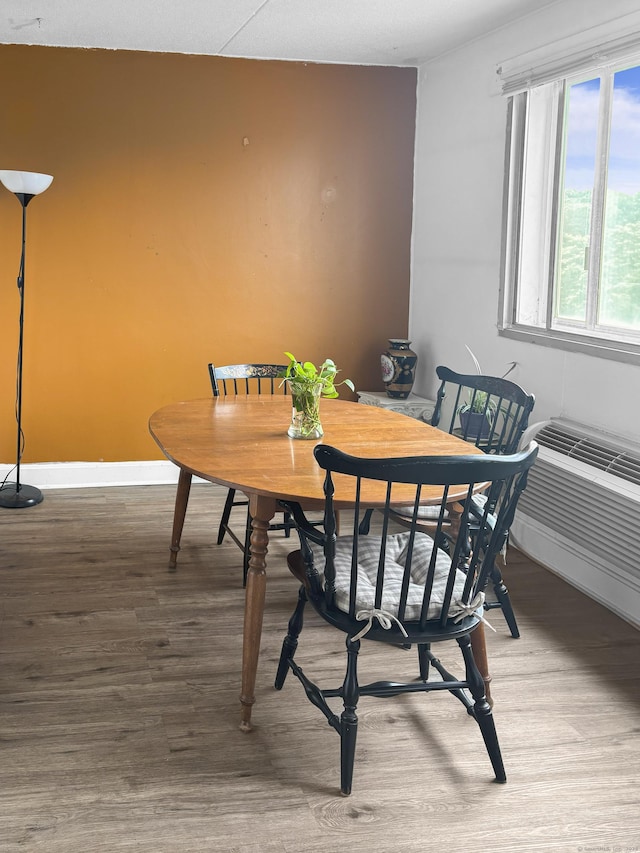 120 Huntington Tpke Unit 606, Bridgeport, CT 06610 - dining area featuring wood finished floors and baseboards