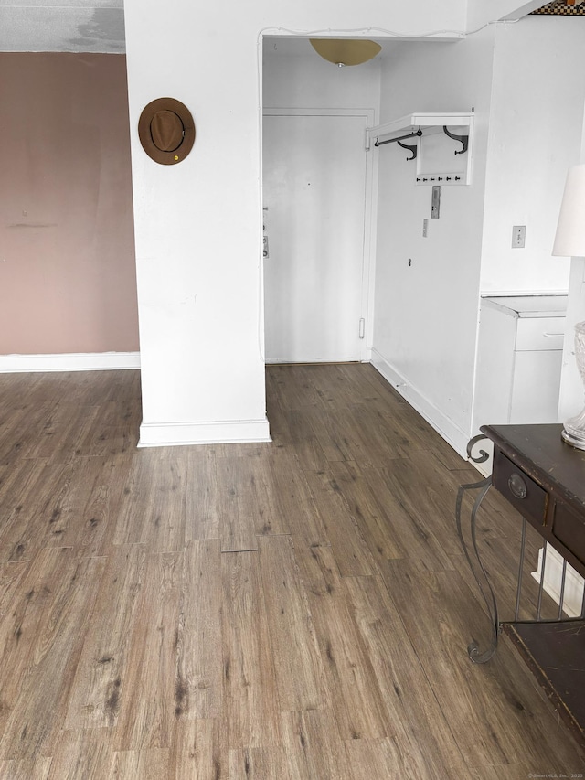 120 Huntington Tpke Unit 606, Bridgeport, CT 06610 - unfurnished dining area featuring wood finished floors