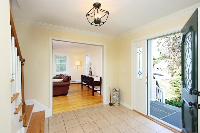 37 Lamplighter Ln, Fairfield, CT 06825 - foyer featuring ornamental molding, light tile patterned floors, baseboard heating, and stairs