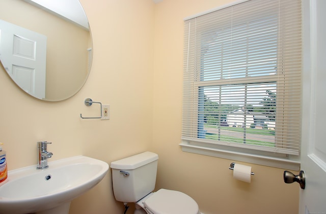 37 Lamplighter Ln, Fairfield, CT 06825 - half bathroom with a sink and toilet