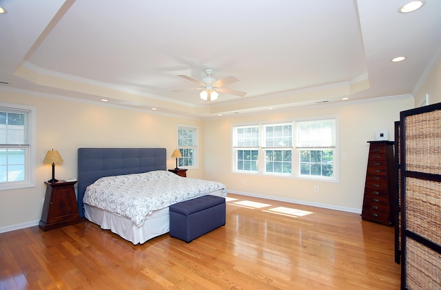 37 Lamplighter Ln, Fairfield, CT 06825 - bedroom with a raised ceiling, multiple windows, crown molding, light wood-type flooring, and recessed lighting