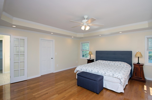 37 Lamplighter Ln, Fairfield, CT 06825 - bedroom with a tray ceiling, wood finished floors, crown molding, recessed lighting, and a ceiling fan