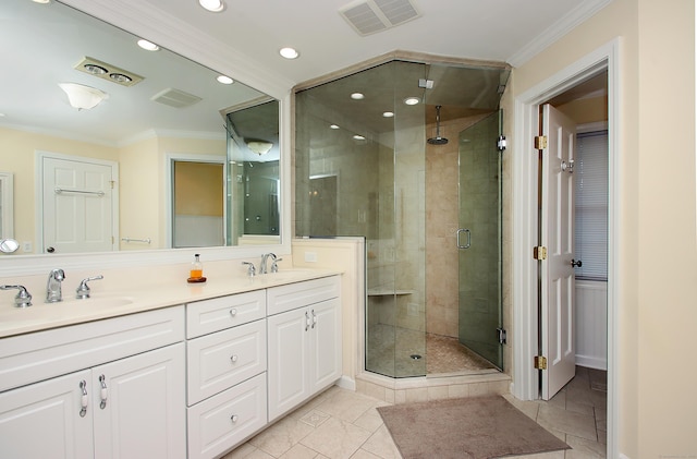37 Lamplighter Ln, Fairfield, CT 06825 - full bath with a stall shower, ornamental molding, double vanity, recessed lighting, and tile patterned flooring