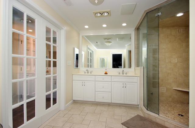 37 Lamplighter Ln, Fairfield, CT 06825 - full bath with a shower stall, double vanity, crown molding, and recessed lighting